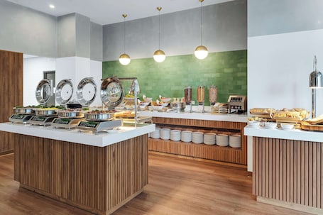 Daily buffet breakfast for a fee. Hilton Garden Inn San Jose Airport City Mall