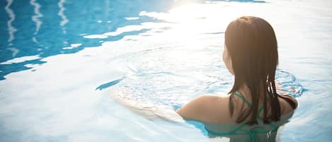 Outdoor pool, open 7:00 AM to 9:00 PM, sun loungers