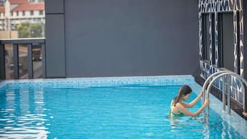 Outdoor pool, open 7:00 AM to 9:00 PM, sun loungers
