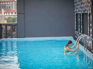 Outdoor pool, open 7:00 AM to 9:00 PM, sun loungers