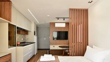 Apartamento Design 410 | Roupas de cama premium, Wi-Fi de cortesia, roupa de cama