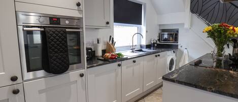 Fridge, dishwasher, electric kettle, toaster