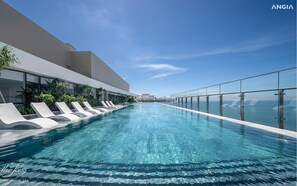 Relax by the pool surrounded by a stunning view.