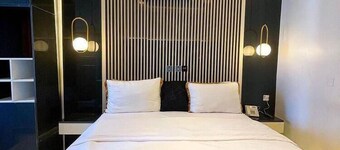 MT DELUXE HOTEL ASABA