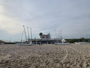 On the beach, sun loungers