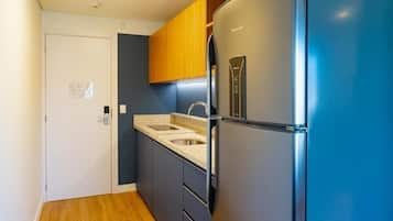 Fridge, microwave, cookware/dishes/utensils