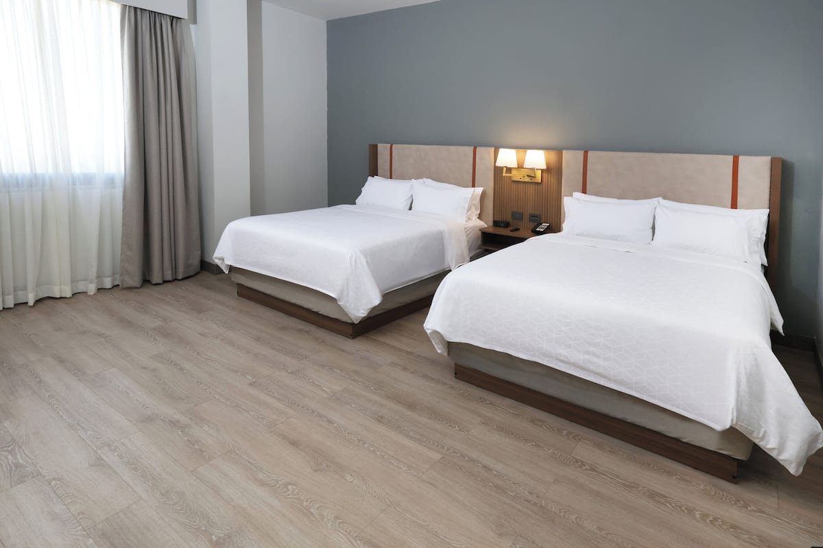 Premium bedding, down duvets, pillow-top beds, in-room safe