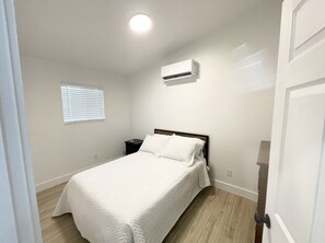 2 dormitorios, tabla de planchar con plancha, wifi y ropa de cama