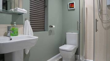 Shower, free toiletries, hair dryer, towels