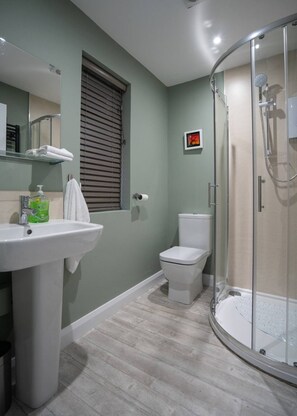 Shower, free toiletries, hair dryer, towels