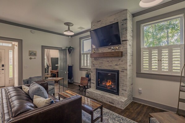 Smart TV, fireplace, books