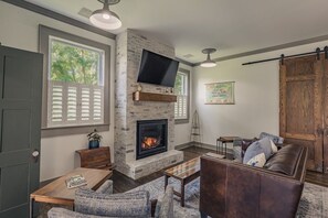 Smart TV, fireplace, books