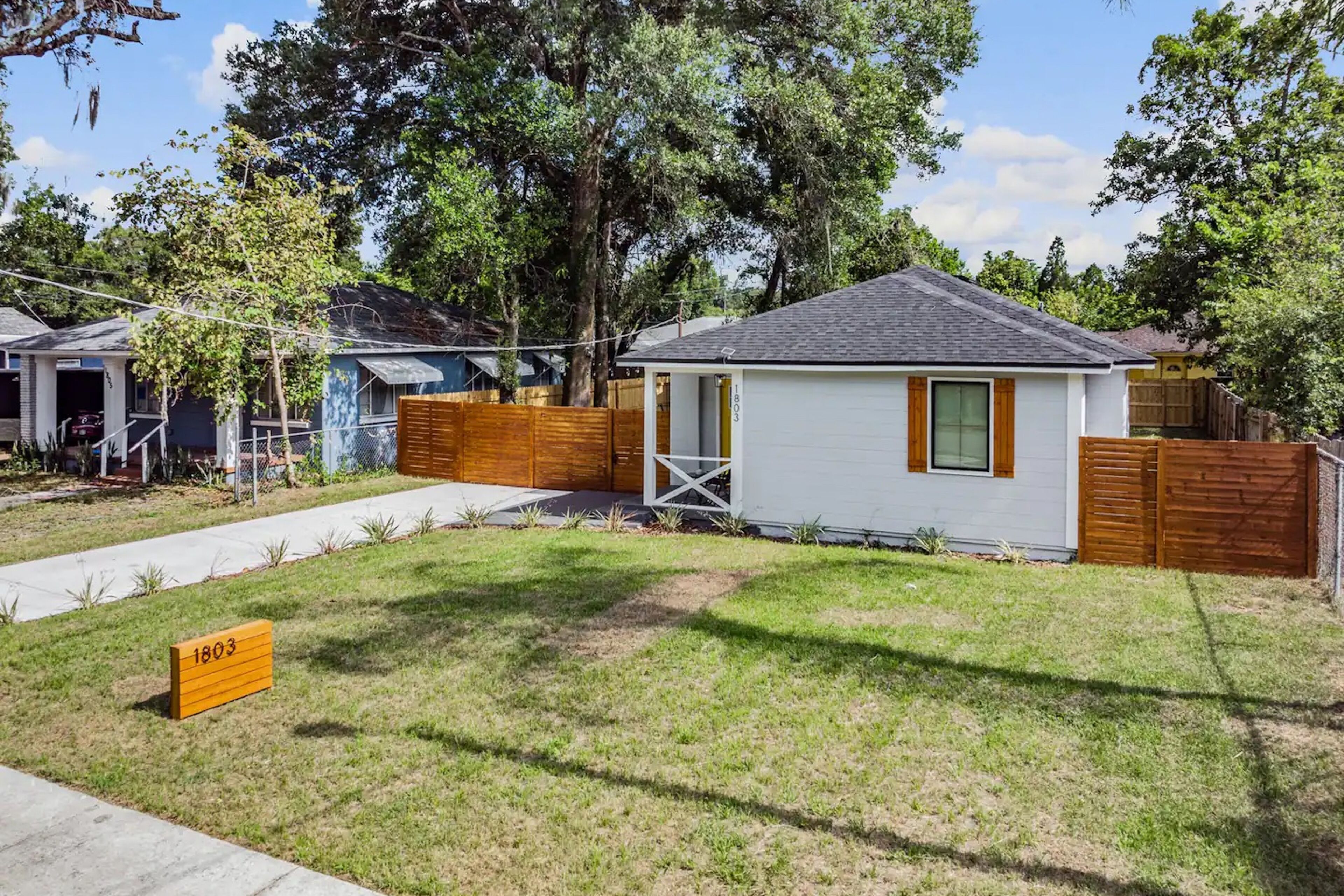 Renovated home + detached in-law suite with yard, W/D, & great location