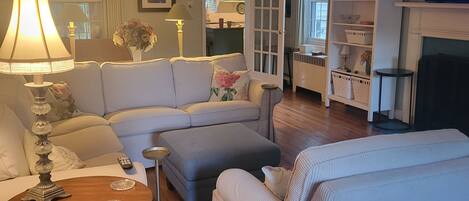 TV, fireplace, books