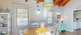 3rd-row beach cottage with ocean views, beach access, deck, & grill