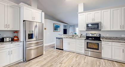 Summerfield home with a fenced-in yard, pool, hot tub, & games