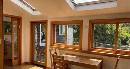 Sunny 3 bedroom home with patio and parking on premises