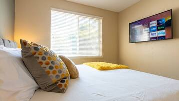 4 bedrooms, desk, iron/ironing board, travel cot