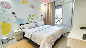 2 bedrooms, desk, iron/ironing board, travel crib