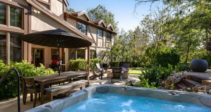 Expansive estate with hot tub, putting green, gourmet kitchen, & fireplaces