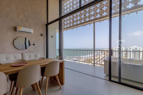 Apartamento luxo | Área de estar | Smart TV 43 polegadas com canais digitais, Netflix
