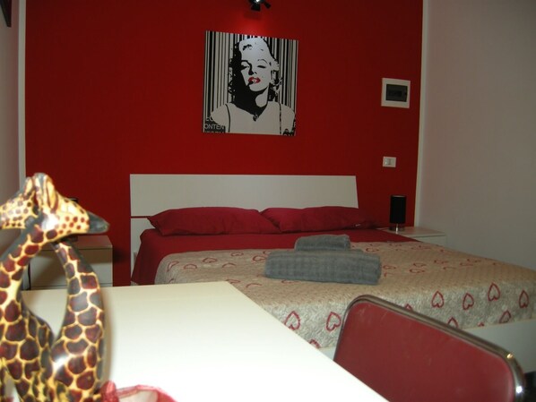 1 غرفة نوم ومكواة/لوح كي وواي فاي وملاءات أسرّة