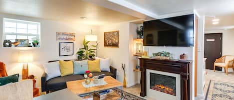 TV, fireplace, books
