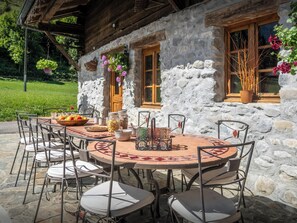 Outdoor dining - La Ferme du Cortet - stone farmhouse with garden and pond - OVO Network (Thônes)