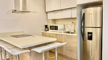 Luxury Apartment, 2 Bedrooms | Private kitchen | Fridge, microwave, stovetop, dishwasher