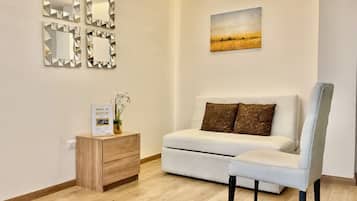 Luxury Apartment, 2 Bedrooms | Living area | 42-inch LED TV with satellite channels