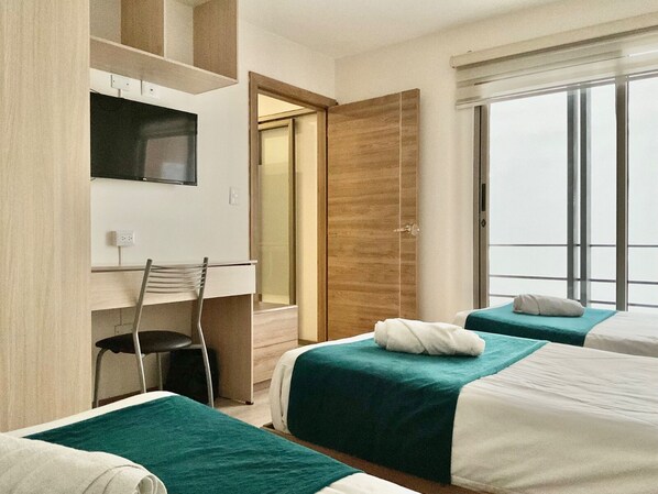 Departamento de lujo, 2 habitaciones | Sábanas de algodón egipcio, ropa de cama de alta calidad y edredón