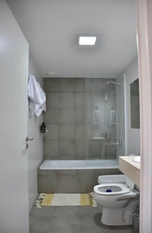 Hair dryer, bidet, towels, soap