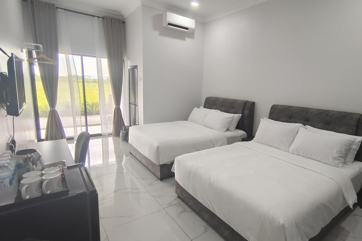 Family Quadruple Room | Desk, blackout drapes, iron/ironing board, bed sheets