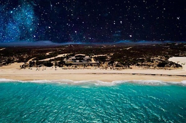 On the beach, sun loungers, beach towels
