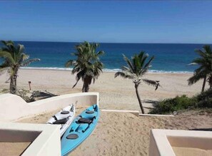 On the beach, sun-loungers, beach towels