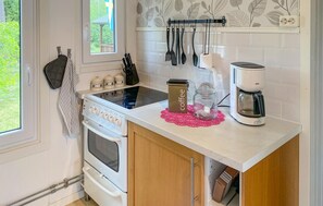 Fridge, stovetop, coffee/tea maker, cookware/dishes/utensils