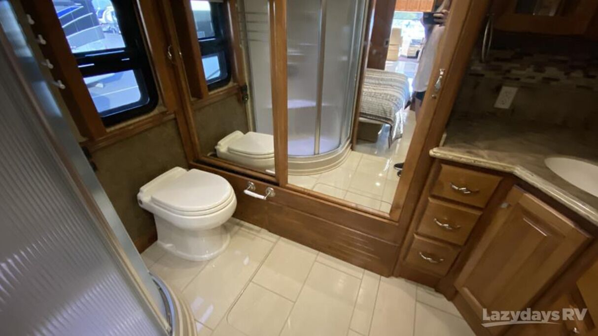 Shower, towels, toilet paper