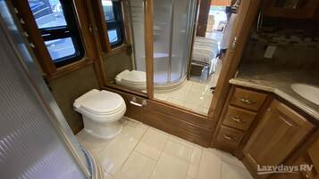 Shower, towels, toilet paper