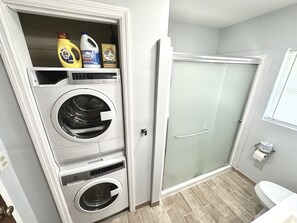 Shower, hair dryer, towels, soap
