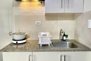 Fridge, microwave, stovetop, electric kettle