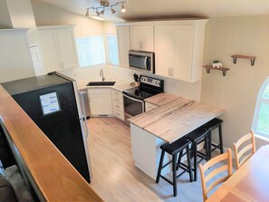 Fridge, microwave, oven, stovetop - Spacious 5 BR/3 Bath Home with a PRIVATE HOT TUB!! 2x full Kitchens & Laundry (West Jordan)