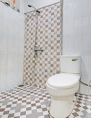 Ducha, toallas y papel higiénico