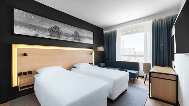 Sengetøy av topp kvalitet, minibar, safe på rommet og skrivebord