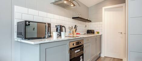 Fridge, toaster, cookware/dishes/utensils