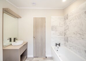 Bathroom - Experience ultimate luxury with the brand-new Faraday lodge with hot tub. (Snowdonia)