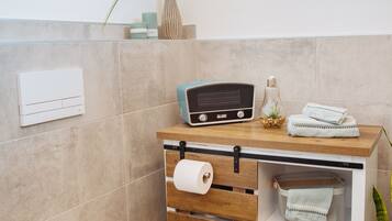 Hair dryer, towels, soap, shampoo