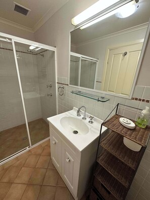 Bathtub, hair dryer, towels