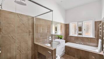 Bathtub, hair dryer, towels