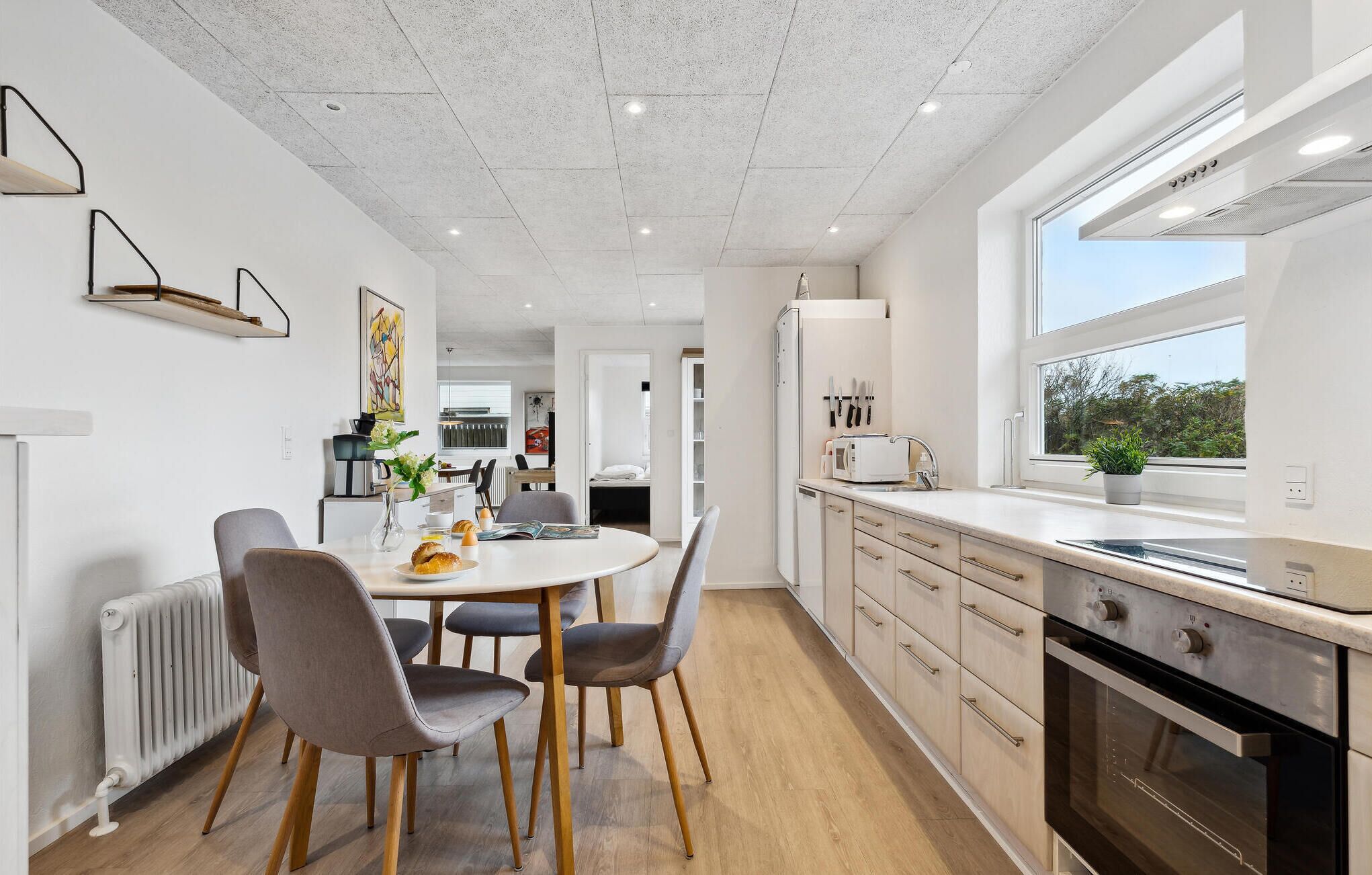 Fridge, stovetop, dishwasher, coffee/tea maker