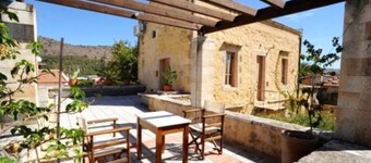 19th century stone house located in the center of a Cretan traditional village.